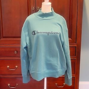 Champion sweatshirt size L. Dark teal color. NWT